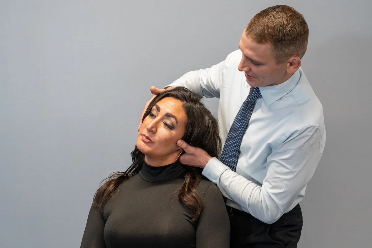 Chiropractic adjustment neck pain relief spinal manipulation at Stonelake Chiropractic in Austin