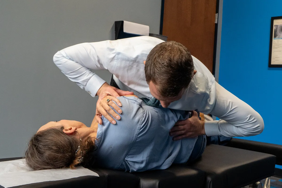 Chiropractic adjustment spinal manipulation back pain relief at Stonelake Chiropractic in Austin