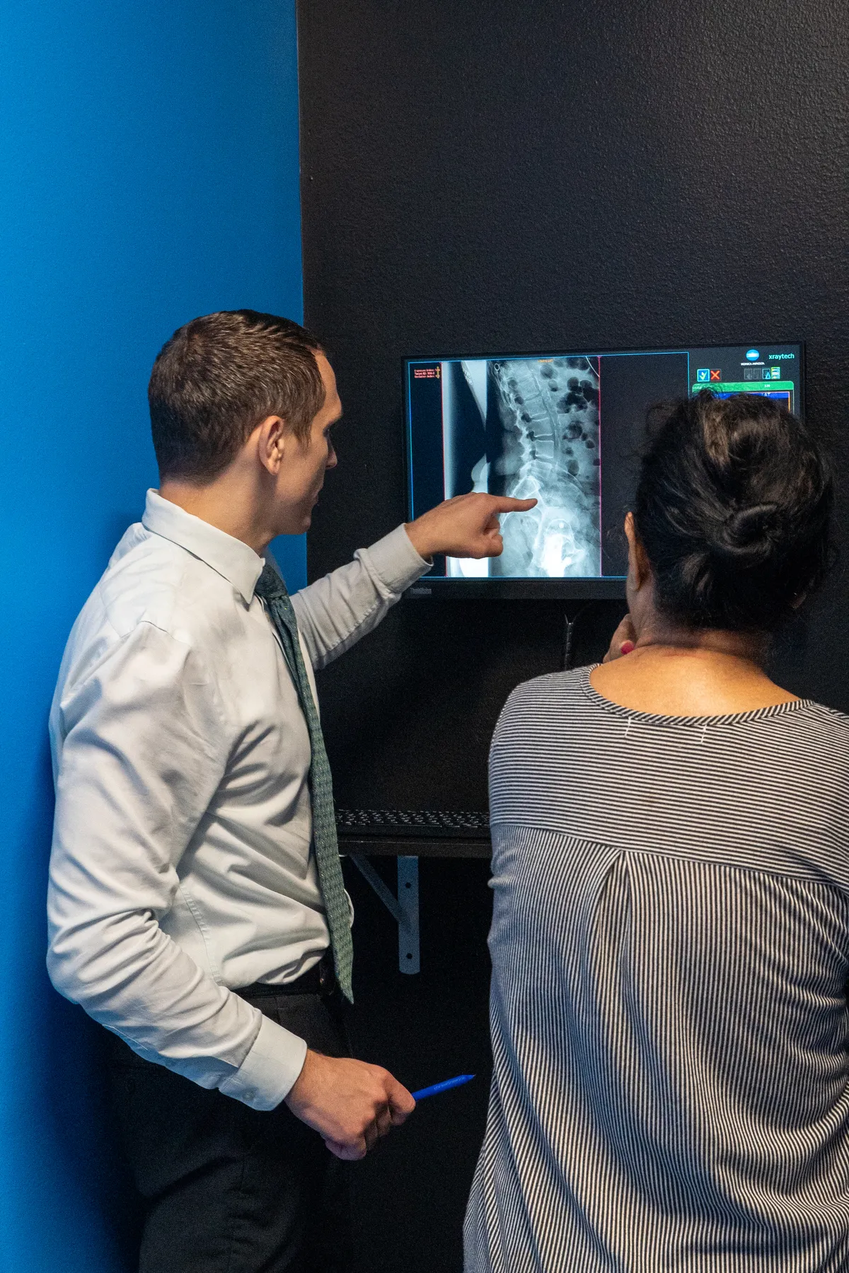 Chiropractor consultation spinal x ray back pain relief at Stonelake Chiropractic in Austin